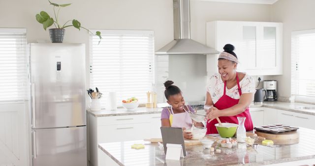 Mother and Daughter Baking at Home Together - Download Free Stock Images Pikwizard.com