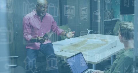 Diverse Team Analyzing Data in Modern Office with Transparency Icons