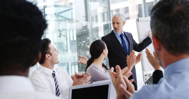 Business Team Applauding Senior Leader In Office Meeting - Download Free Stock Images Pikwizard.com