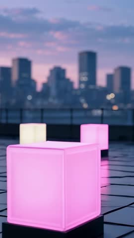 Vertical Rooftop Video Showing Glowing Color-Changing Cubes Reflecting on Wet Tiles at Dusk