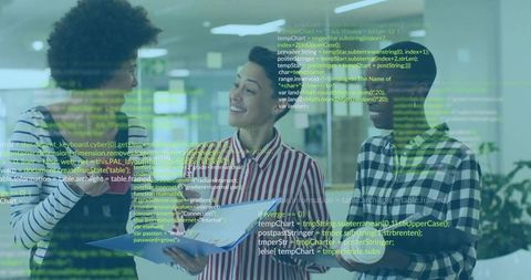 Diverse Team Collaborating with Technology and Innovation in Modern Office