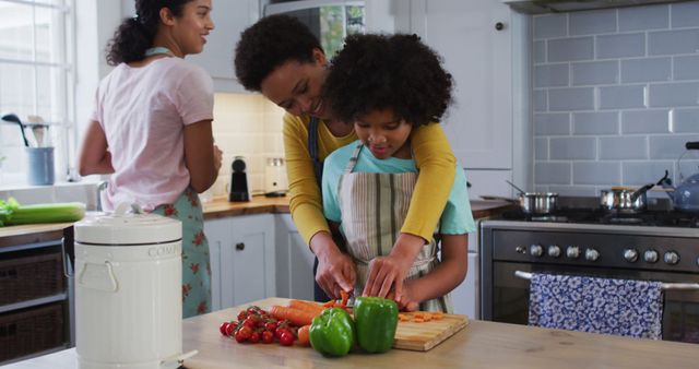 Mother Teaching Daughter to Cook in a Homey Kitchen - Download Free Stock Images Pikwizard.com