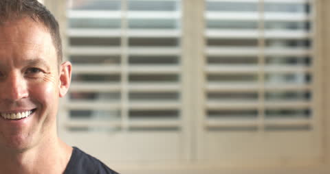 Smiling Caucasian Professional in Modern Clean Setting