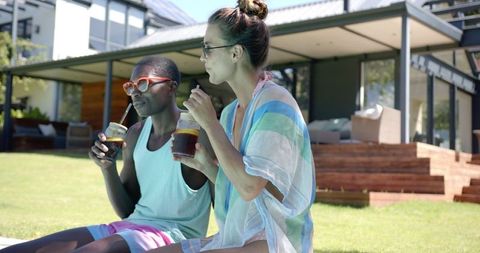 Relaxed Diverse Couple Enjoying Refreshing Drinks by Backyard Pool - Download Free Stock Images Pikwizard.com