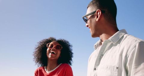 Happy Young Couple Strolling Beach Promenade Sunglasses