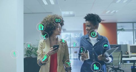 Colleagues Discussing Energy Innovation in Modern Office