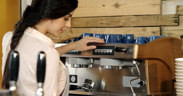 Young Barista Operating Espresso Machine in Coffee Shop - Download Free Stock Images Pikwizard.com