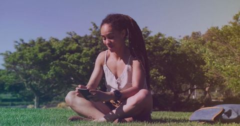 Tech-Savvy Woman Enjoying Outdoor Smartphone Browsing - Download Free Stock Images Pikwizard.com