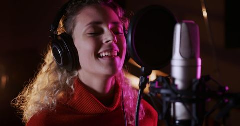 Female Singer Recording Music in Studio with Passion - Download Free Stock Images Pikwizard.com