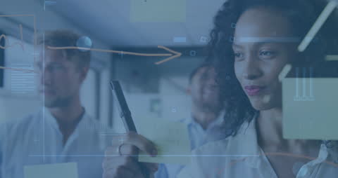 Team Collaborating on Data Strategies with Digital Interface