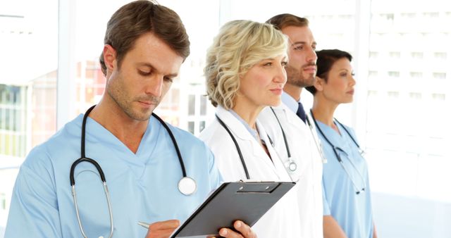 Team of Doctors and Nurses in Medical Uniforms Standing Together - Download Free Stock Images Pikwizard.com