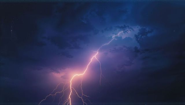 Dramatic Lightning Bolt in Stormy Purple Night Sky