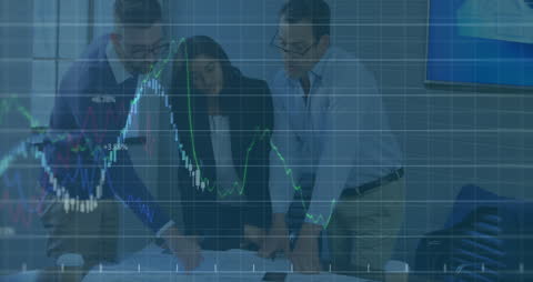 Collaborative Team Analyzing Financial Data Charts