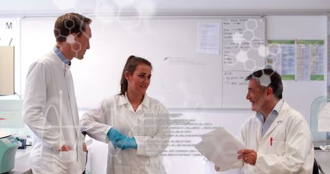 Doctors Analyzing Data with Advanced Digital Interface in Laboratory - Download Free Stock Images Pikwizard.com