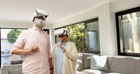 Senior Couple Exploring Virtual Reality at Home