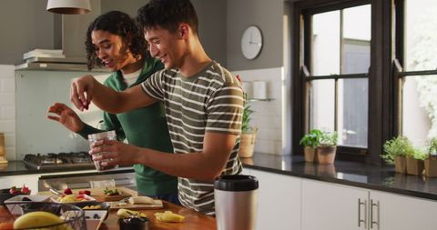 Diverse Male Couple Enjoying Healthy Cooking at Home