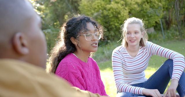 Diverse Group of Friends Relaxing in Park on a Sunny Day - Download Free Stock Images Pikwizard.com