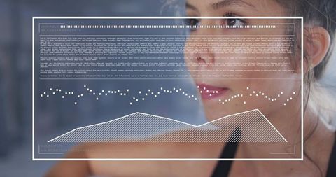 Smiling woman wearing black strappy top displaying translucent HUD fitness analytics in gym