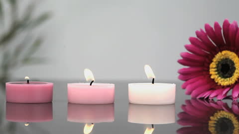 Relaxing Spa Candles and Flower Reflection