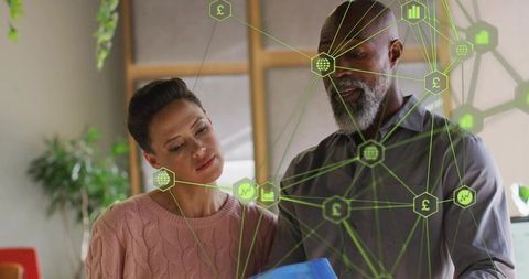 Diverse Team Analyzing Data with Futuristic Analytics Icons