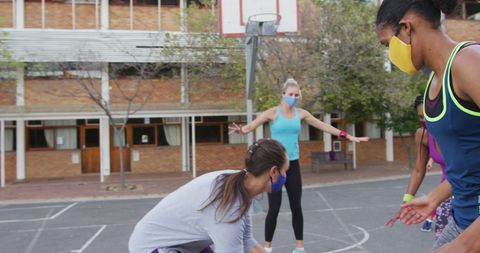Women Basketball Players Wearing Masks Outdoor Game