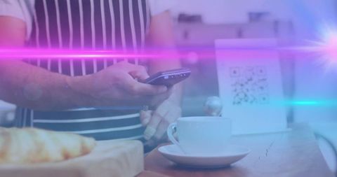 Barista with smartphone near cafe qr code and coffee