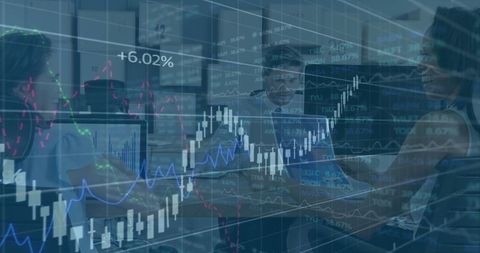 Finance team analyzing digital stock charts in modern office environment