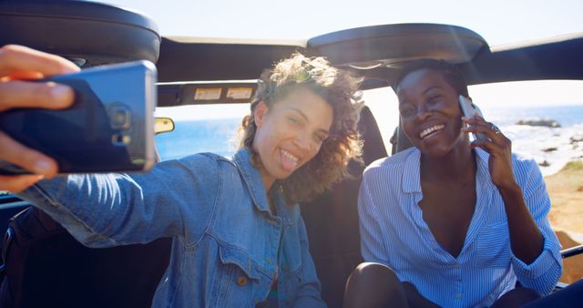 Friends Enjoying Road Trip with Selfie and Phone Call by the Sea - Download Free Stock Images Pikwizard.com