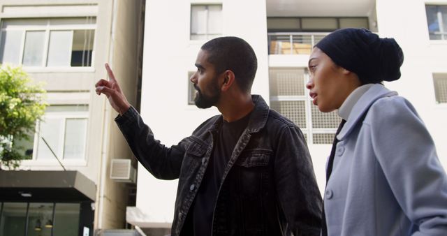 Couple Discussing Directions in Urban Environment - Download Free Stock Images Pikwizard.com