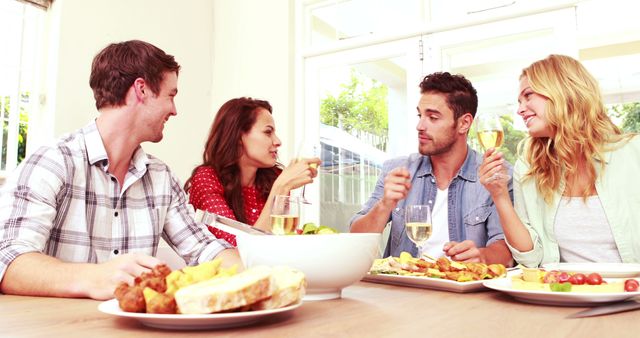 Group of Friends Enjoying Dinner and Wine Indoors - Download Free Stock Images Pikwizard.com