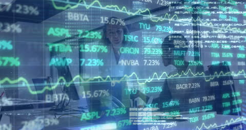 Financial Data Graphics Overlay Diverse Women Collaborating in Office