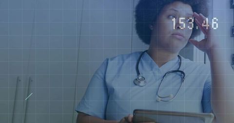 Healthcare professional contemplating with modern technology