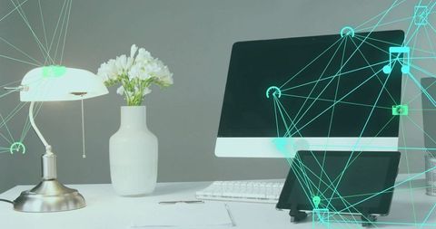 Modern office desk with digital connectivity overlay