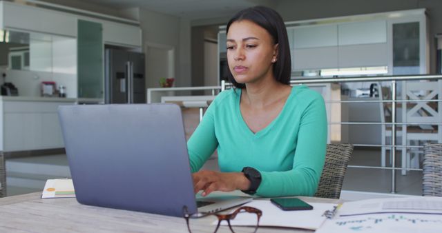 Focused Woman Working from Home on Laptop - Download Free Stock Images Pikwizard.com