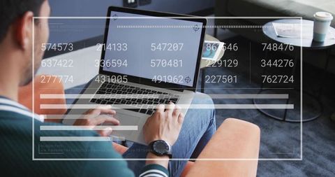 Casual Freelancer Typing on Laptop with Futuristic Digital Overlay