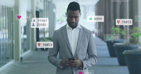 Business Professional Engaging with Social Media in Urban Setting