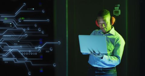IT Engineer Analyzing Data with Laptop in Server Room - Download Free Stock Images Pikwizard.com