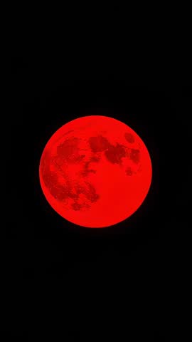 Vertical video Blood Moon turning red and zooming into detailed lunar craters