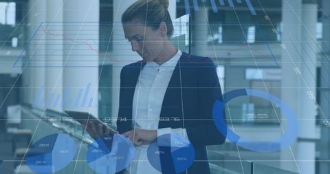 Businesswoman with Tablet in Overlaid Digital Data Analysis Interface