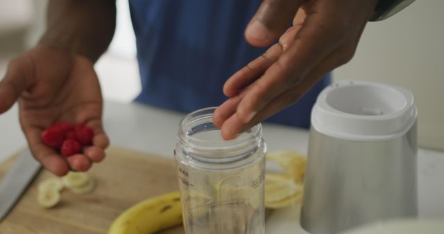 Hands Preparing Fruit Smoothie with Blender - Download Free Stock Images Pikwizard.com