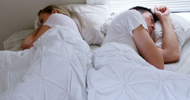Couple sleeping on bed in bedroom - Download Free Stock Photos Pikwizard.com