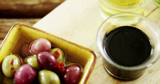 Variety of Olives and Sauces on Wooden Board - Download Free Stock Images Pikwizard.com