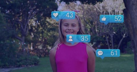 Young Girl Engaging with Social Media in Tranquil Backyard