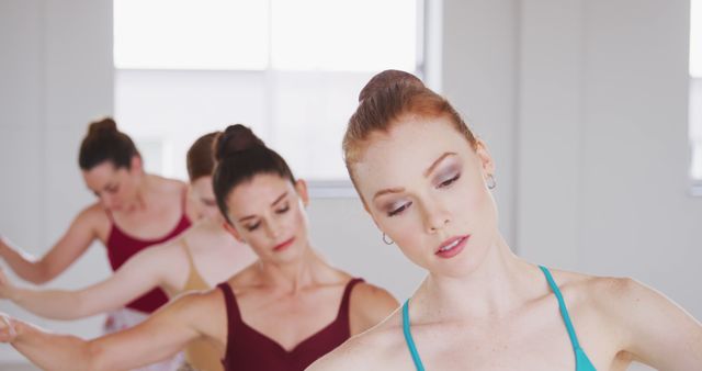 Focused Ballerinas Practicing Dance Poses in Studio - Download Free Stock Images Pikwizard.com