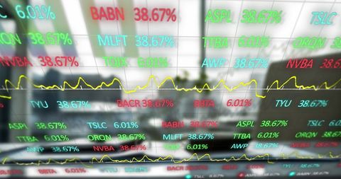 Digital Stock Market Data Overlaying Office Desk