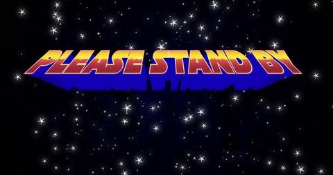 Retro 'please stand by' text among cosmic stars