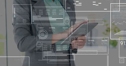 Business Professional Analyzing Futuristic Data Overlays on Tablet