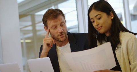 Business Team Analyzing Data for Project Collaboration