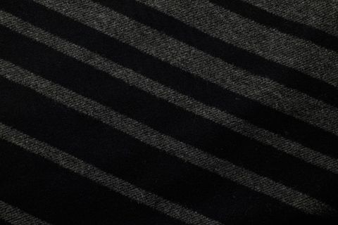 Dark diagonal striped wool texture minimal monochrome background abstract textile pattern