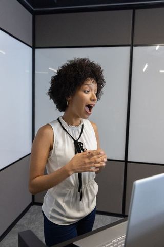 African american businesswoman engaging in videoconference